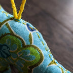 Handcrafted cotton elephant or dinosaur Christmas ornament – Glimmer Amber design, fabric detail. Example from random pack of six.