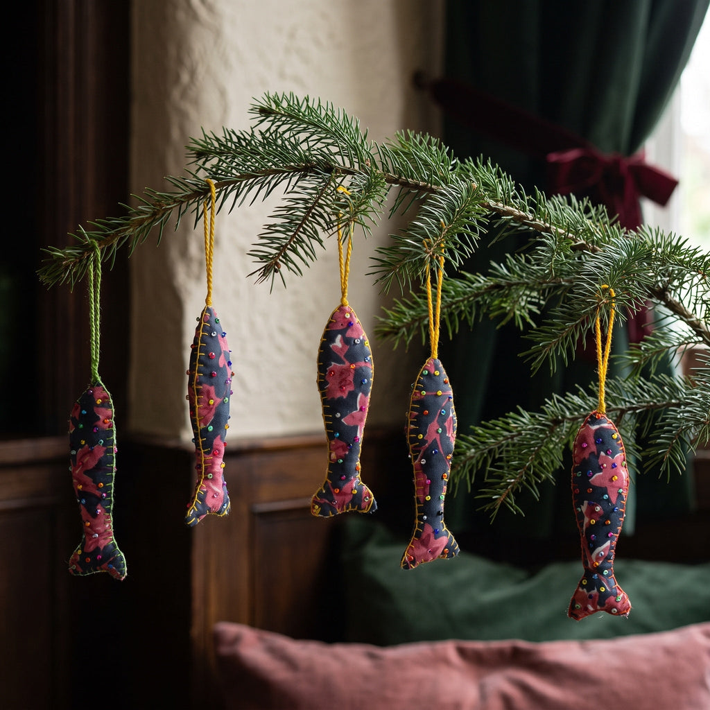 Handcrafted cotton fish Christmas ornament, Whisper Fern design – hanging on a Christmas tree. Example from surprise pack of six.