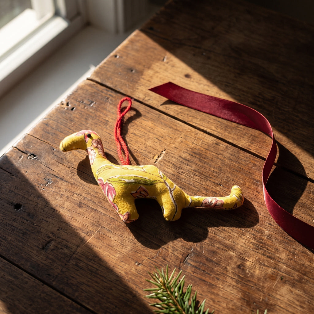 Handcrafted cotton elephant or dinosaur Christmas ornament – Dew Fern design, styled photo. Example from random pack of six.