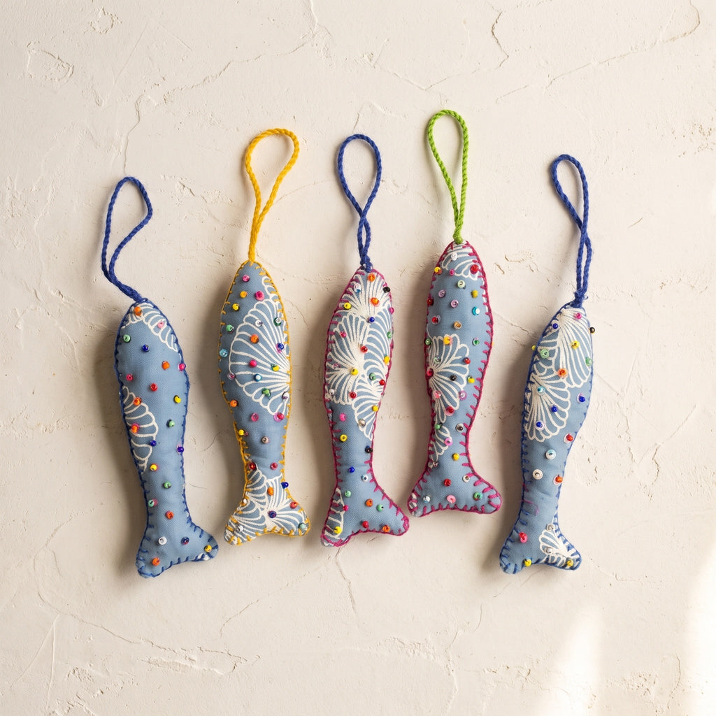 Handcrafted cotton fish Christmas ornament, Clay Dew design – studio view. Example from surprise pack of six.