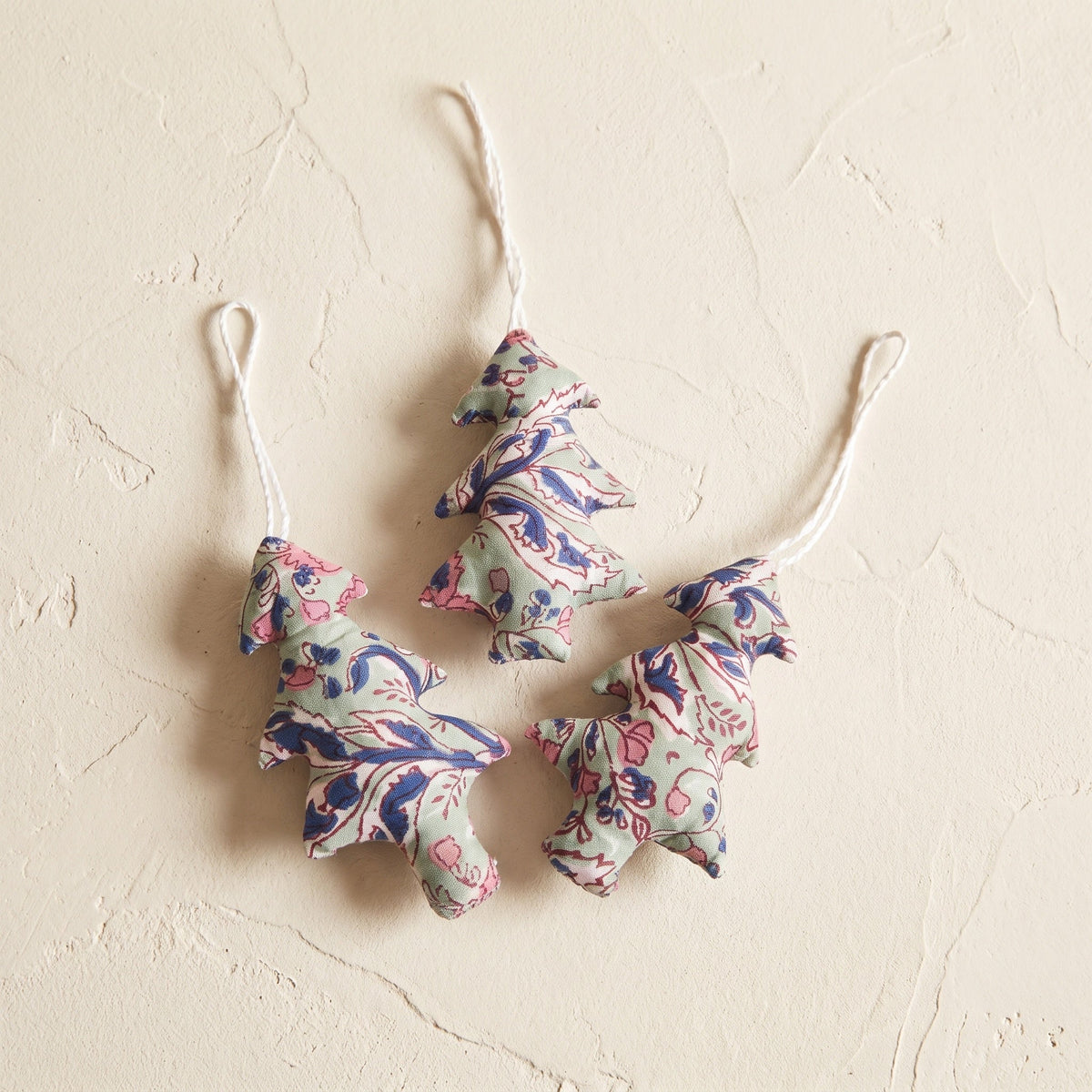 Handcrafted cotton Christmas tree ornament: Heirloom Lotus design, studio view. Example design in surprise pack of six.