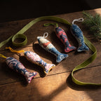 Handcrafted cotton fish Christmas ornament, Verdant Fern design – styled photograph. Example from surprise pack of six.