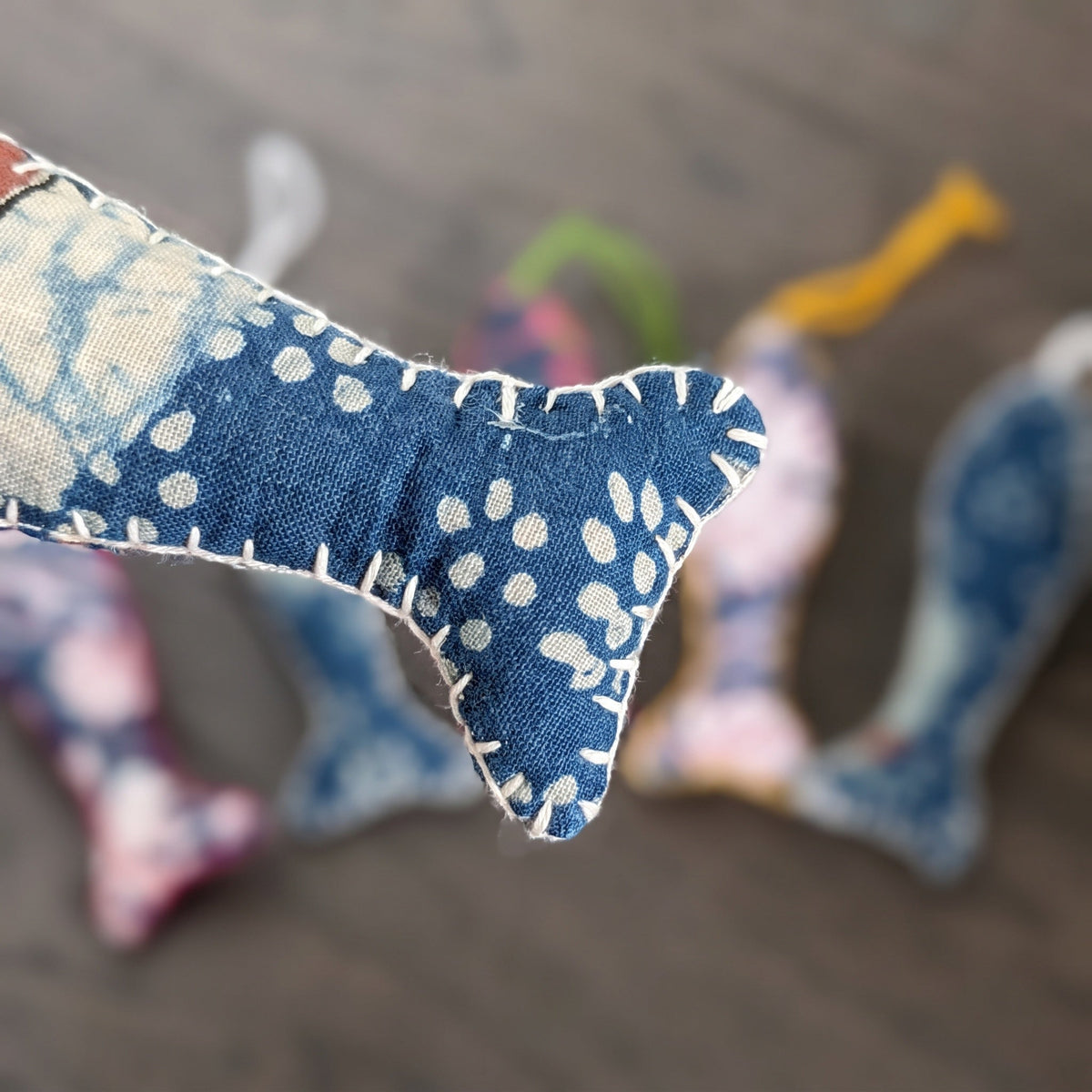 Handcrafted cotton fish Christmas ornament, Verdant Fern design – close-up detail. Example from surprise pack of six.