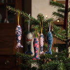 Handcrafted cotton fish Christmas ornament, Verdant Fern design – hanging on a Christmas tree. Example from surprise pack of six.