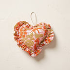 Sun O cotton heart ornament – studio view