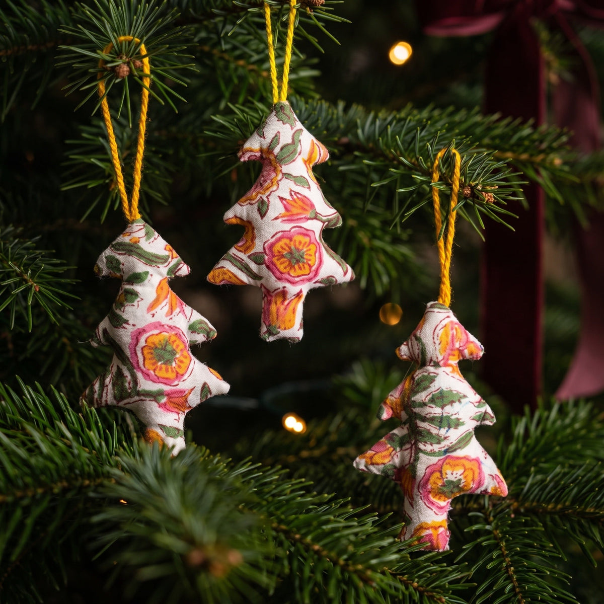 Handcrafted cotton Christmas tree ornament: Maple Grove design, styled on Christmas tree. Example design in surprise pack of six.