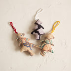 Handcrafted cotton Christmas tree ornament: A Sun design, studio view. Example design in surprise pack of six.