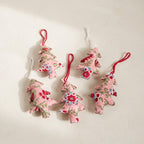 Handcrafted cotton Christmas tree ornament: Saffron Glimmer design, studio view. Example design in surprise pack of six.