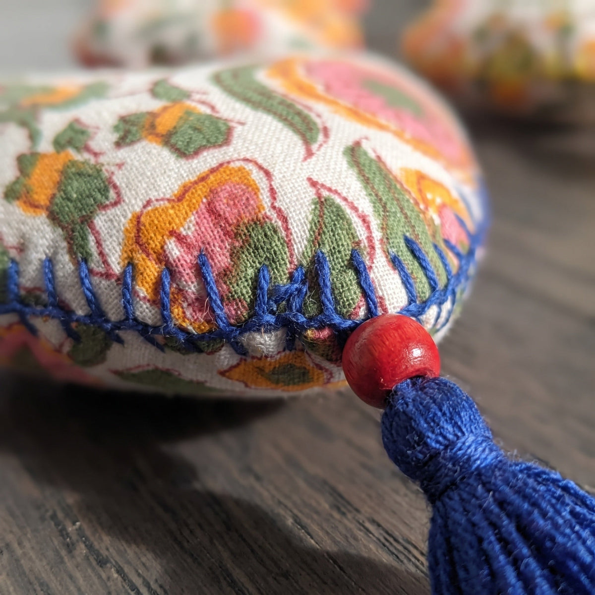 Non-beaded cotton heart Christmas ornament, Gentle Glow design – fabric detail. Example from random assortment of six.