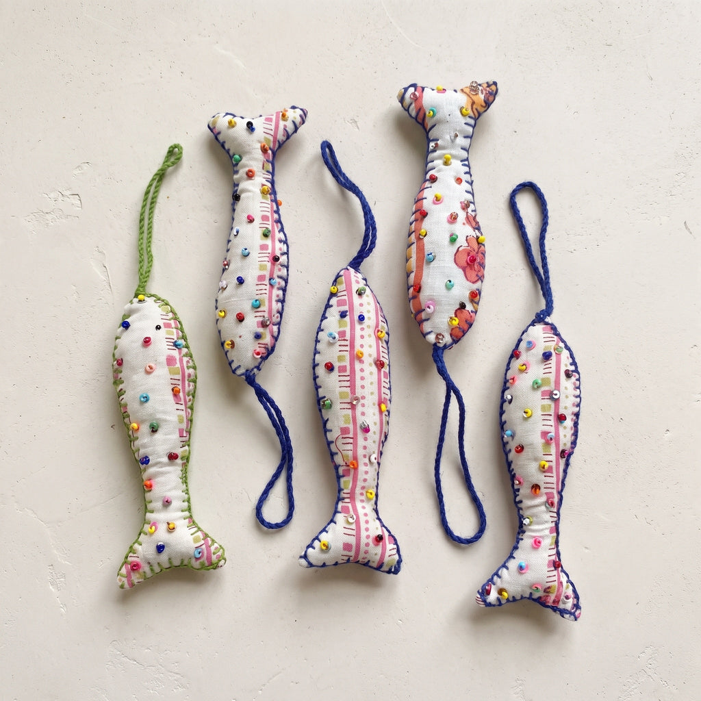 Handcrafted cotton fish Christmas ornament, Whisper Bloom design – studio view. Example from surprise pack of six.