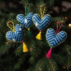 Non-beaded cotton heart Christmas ornament, Mist Tide design – on a Christmas tree. Example from random assortment of six.