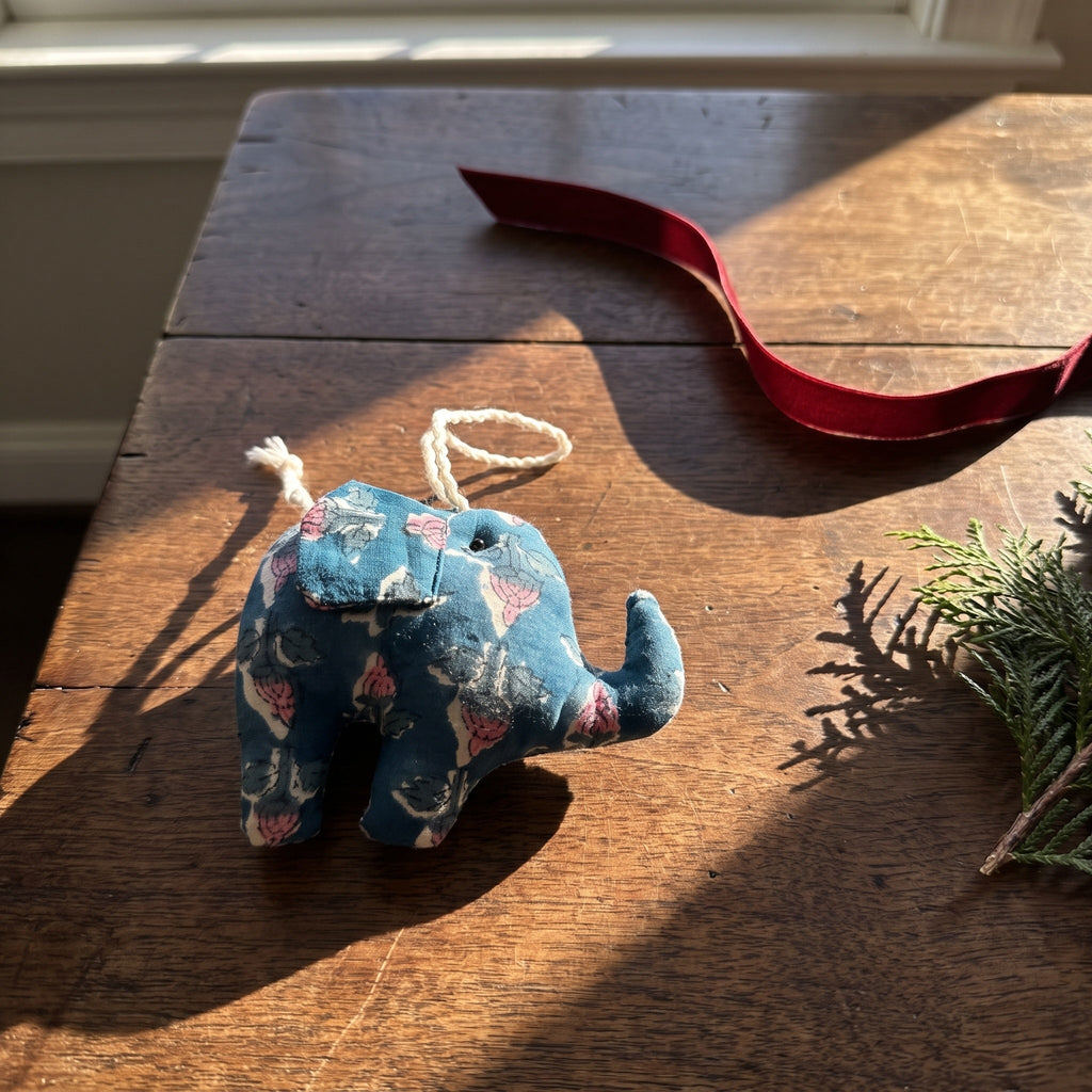 Handcrafted cotton elephant or dinosaur Christmas ornament – Sol Air design, styled photo. Example from random pack of six.