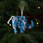 Handcrafted cotton elephant or dinosaur Christmas ornament – Sol Air design, hanging on a Christmas tree. Example from random pack of six.