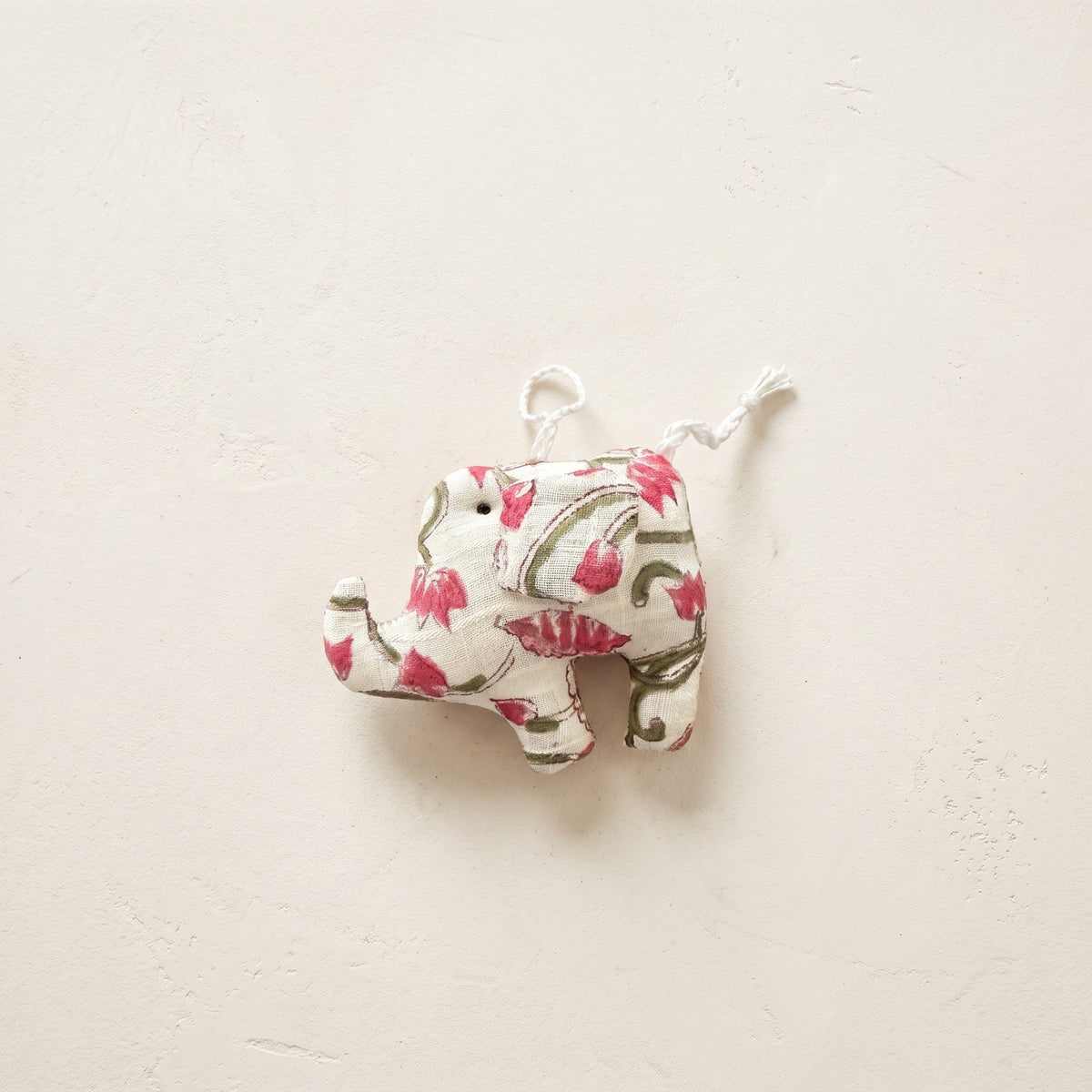 Handcrafted cotton elephant or dinosaur Christmas ornament – Moss Fern design, studio hero. Example from random pack of six.